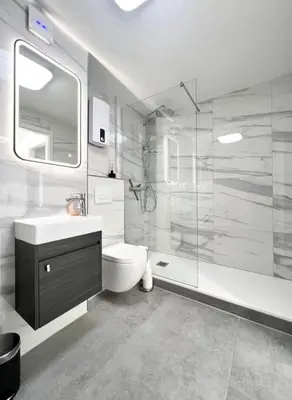 Ein Badezimmer in der Unterkunft Schickes Apartment in City Lage B7