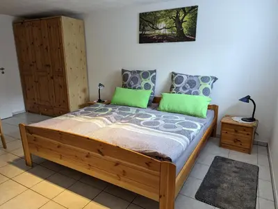 Ein Bett oder Betten in einem Zimmer der Unterkunft Ferienwohnung Freitag