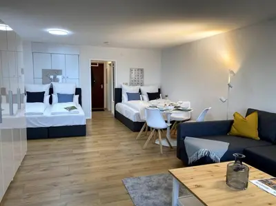 Ein Bett oder Betten in einem Zimmer der Unterkunft 1-Zimmerapartment mit Burgblick