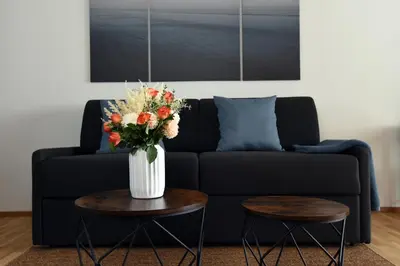 Ein Sitzbereich in der Unterkunft InHomeVision Neubau, Design, Balkon, Barrierefrei, WLAN
