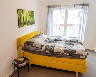 Ein Bett oder Betten in einem Zimmer der Unterkunft Ferienwohnung am Erzberg