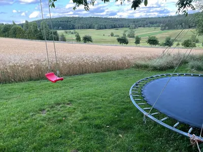 Ein Garten an der Unterkunft Familienglück im Odenwald