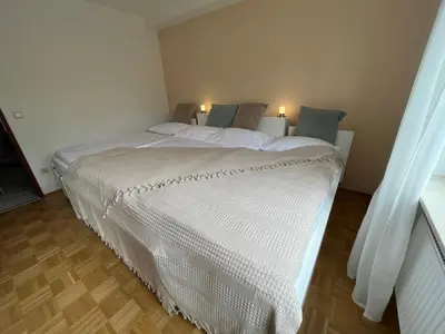 Ein Bett oder Betten in einem Zimmer der Unterkunft Familienglück im Odenwald