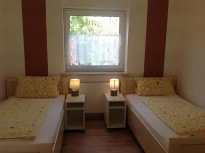 Ein Bett oder Betten in einem Zimmer der Unterkunft Ferienwohnungen Bella Vita