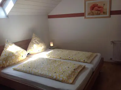 Ein Bett oder Betten in einem Zimmer der Unterkunft Ferienwohnungen Bella Vita