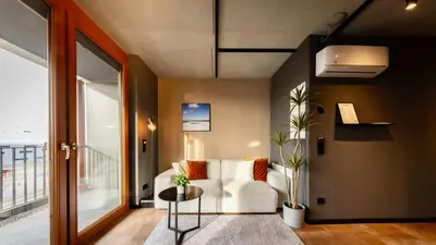Ein Sitzbereich in der Unterkunft Stadthaus Neckarsulm serviced apartments - Stadthaus Heiner