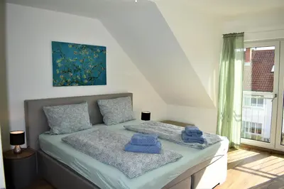 Ein Bett oder Betten in einem Zimmer der Unterkunft Heiligenbergblick