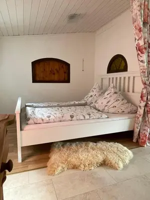 Ein Bett oder Betten in einem Zimmer der Unterkunft Ferienhaus Sternschnuppe