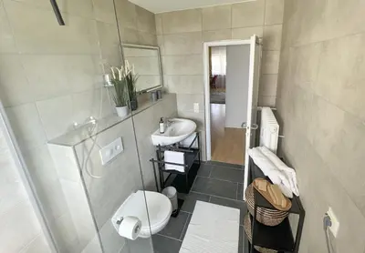 Ein Badezimmer in der Unterkunft M&D Apartments nähe Volkspark mit Balkon - Netflix - Küche