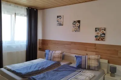 Ein Bett oder Betten in einem Zimmer der Unterkunft Ferienwohnung Schmidt