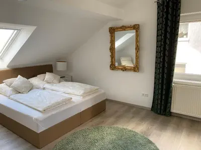 Ein Bett oder Betten in einem Zimmer der Unterkunft Am Kienbusch - Südliche Weinstraße - Dachgeschoss