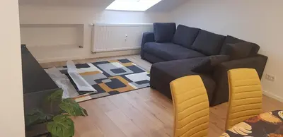 Ein Sitzbereich in der Unterkunft Joanna Apartment - Schwetzingen 3