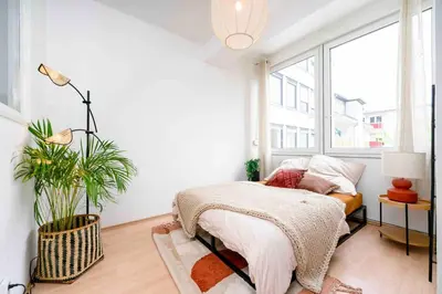 Ein Bett oder Betten in einem Zimmer der Unterkunft Comfy Apartment Heart of Mannheim