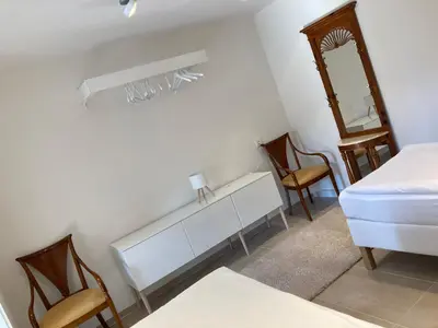 Ein Bett oder Betten in einem Zimmer der Unterkunft SweetSuites 40A Lavendelhaus