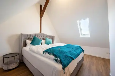 Ein Bett oder Betten in einem Zimmer der Unterkunft Lit Living - Luxury - Box Spring - Parking - 4 Bed Rooms - 13 persons - Duplex apartment