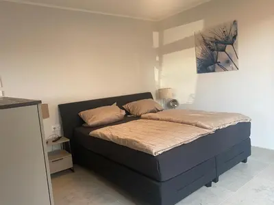 Ein Bett oder Betten in einem Zimmer der Unterkunft Apartment Loch 10, Bitzgrunder Weg 3
