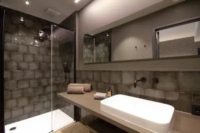 Ein Badezimmer in der Unterkunft DAS Hotel by Hopfenschlingel