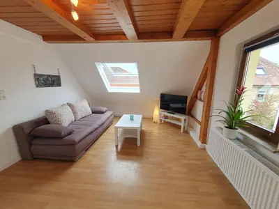 Ein Sitzbereich in der Unterkunft Gemütliche zentrale DG Wohnung in Mühlacker