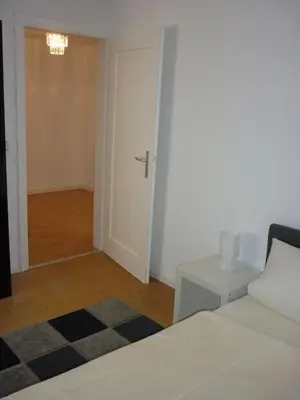 Ein Bett oder Betten in einem Zimmer der Unterkunft Prinz City Apartments