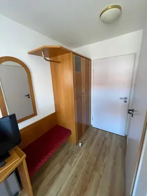 Ein Sitzbereich in der Unterkunft City Pension