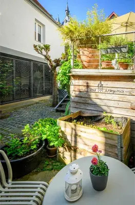 Ein Garten an der Unterkunft Casa Wimpina - geschmackvolles Appartement im Herzen der Altstadt