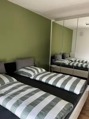 Ein Bett oder Betten in einem Zimmer der Unterkunft Ferienwohnungen Martin