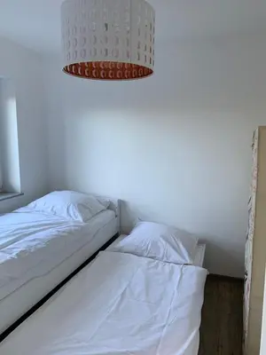 Ein Bett oder Betten in einem Zimmer der Unterkunft Ferienwohnungen Gergert Nr4