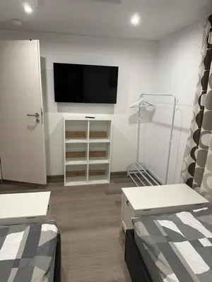 Ein Bett oder Betten in einem Zimmer der Unterkunft KRAICHGAU # 2-ZKD mit EBK, WLAN, Monteurzimmer, SELF-CHECK-IN