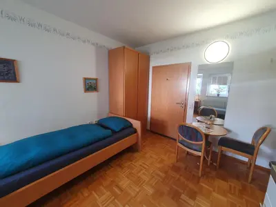 Ein Bett oder Betten in einem Zimmer der Unterkunft ABM Apartment Haus