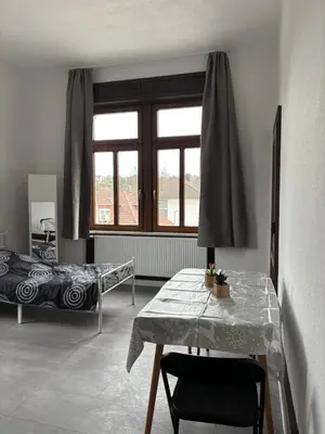 Ein Bett oder Betten in einem Zimmer der Unterkunft 1 Zimmer für 2 Personen Bruchsal ruhige Lage