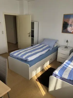 Ein Bett oder Betten in einem Zimmer der Unterkunft Gästehaus Lützelbach
