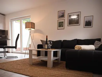 Ein Sitzbereich in der Unterkunft Ferienwohnung Am Ringelsberg