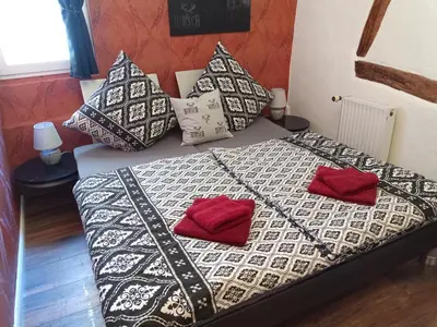 Ein Bett oder Betten in einem Zimmer der Unterkunft Fürstenstube