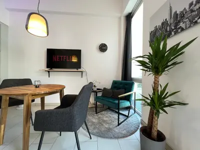 TV/Unterhaltungsangebot in der Unterkunft The East Apartment by Rabe - Parkplatz, Smart-TV, Netflix