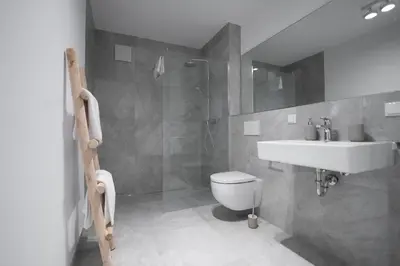 Ein Badezimmer in der Unterkunft SCHÖNTALHAUS City Apartments