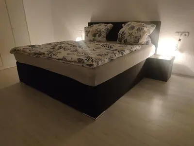 Ein Bett oder Betten in einem Zimmer der Unterkunft Urlaub am Rhein Speyer Hockenheim