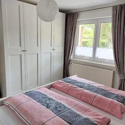 Ein Bett oder Betten in einem Zimmer der Unterkunft Ferienwohnung Hanna