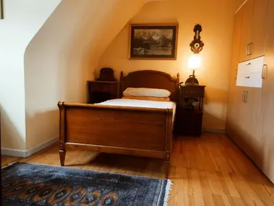 Ein Bett oder Betten in einem Zimmer der Unterkunft Zimmer mit zwei Räumen