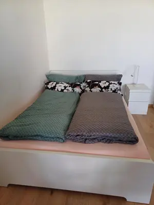 Ein Bett oder Betten in einem Zimmer der Unterkunft feel-good-appartements