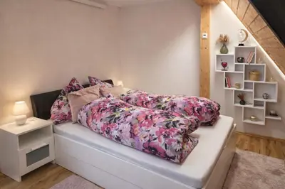 Ein Bett oder Betten in einem Zimmer der Unterkunft Cosy Retreat in Friolzheim