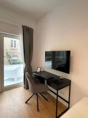 TV/Unterhaltungsangebot in der Unterkunft Modernes Apartment im Zentrum von Karlsruhe