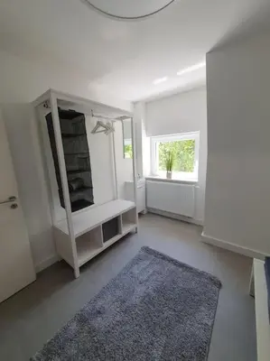 Ein Bett oder Betten in einem Zimmer der Unterkunft 3.OG / Top 4 Zimmer Wohnung KA-West
