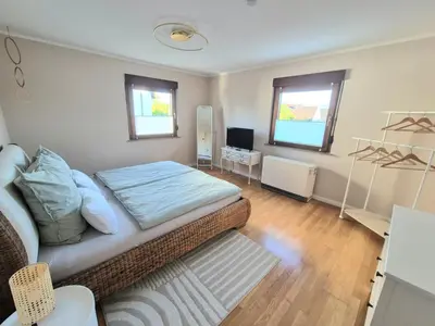 Ein Sitzbereich in der Unterkunft Ferienwohnung Grünoase mit Sonnenbalkon