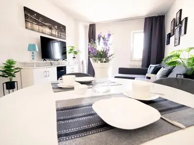 Ein Sitzbereich in der Unterkunft City Suite - 5 Min to HBF