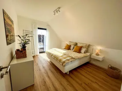 Ein Bett oder Betten in einem Zimmer der Unterkunft Vyne Apartments - Dachterrasse - Grill - Parkplatz