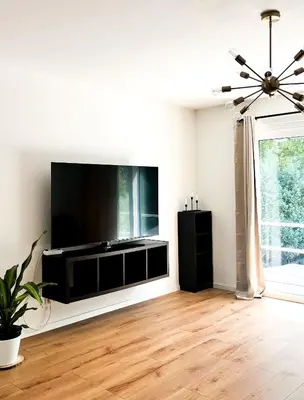 TV/Unterhaltungsangebot in der Unterkunft 2 ZKB Apartment in Mannheim Küche - Parken - Großer TV