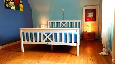 Ein Bett oder Betten in einem Zimmer der Unterkunft Gemütliches Privatzimmer