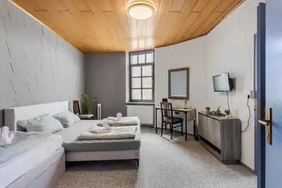 Ein Bett oder Betten in einem Zimmer der Unterkunft Family and Friends Hassloch