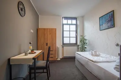 Ein Bett oder Betten in einem Zimmer der Unterkunft Family and Friends Hassloch