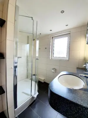 Ein Badezimmer in der Unterkunft Hotel in den Herrnwiesen